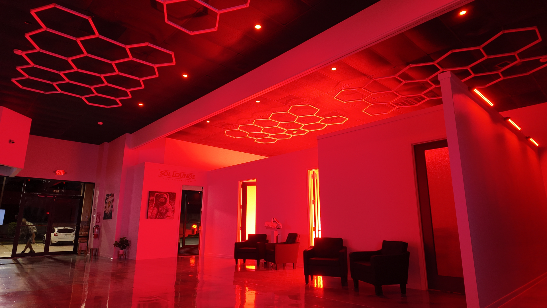 REDSOL wellness environment with ambient red light therapy - League City TX REDSOL Wellness Club red light therapy room with ambient red lighting in League City Texas